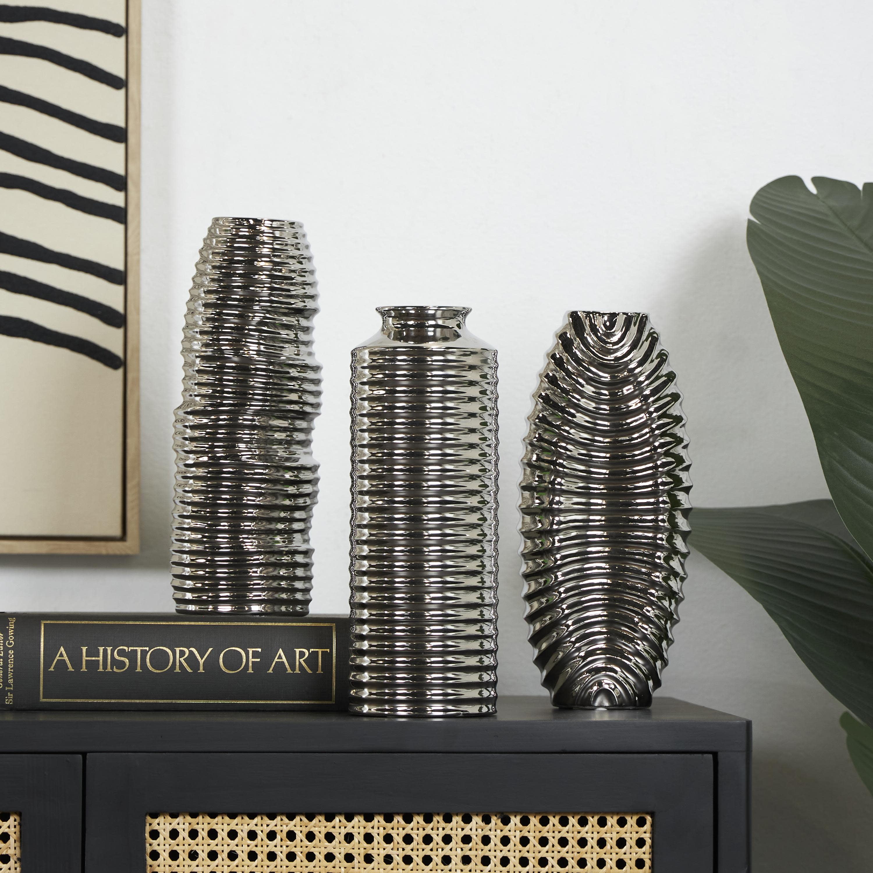 DecMode 4"W, 11"H Dimensional Ribbed Silver Ceramic Vase with Varying Shapes, Set of 3