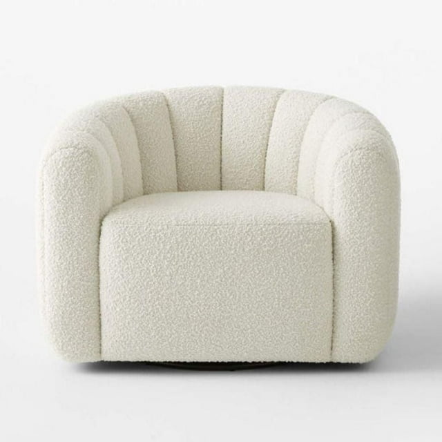 Bibi II Lounge Chair upholstered in white boucle fabric featuring a rounded back and armrests for comfortable seating.