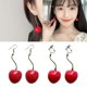 thumbnail image 2 of Pendientes de cereza roja, pendientes de corazón de niña dulce, pendientes sencillos y encantadores de otoño e invierno, orejas sin perforar, clips para las orejas, 2 of 5