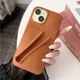 thumbnail image 3 of Estuche para teléfono de silicona suave con diseño de lápiz labial para iPhone 11, 12, 13, 14, 15 Pro Max, soporte portátil para brillo de labios Rhode Hailey, 3 of 5