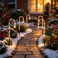 thumbnail image 5 of KOYPTL Christmas Decorations for Outdoor 5-In-1 Solar Ground Stake Lights Snowman Design With Scarf Hat Candy Cane Outdoor Xmas Decor for Yard Lawn Garden Patio Holiday Ambiance Lights, 5 of 6