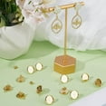 thumbnail image 4 of 1 caja de 16 piezas de aretes de cabujón de 12 mm en blanco, chapados en oro de 24 quilates, con bandeja de bisel redonda plana, con poste, accesorios para aretes con 20 tuercas para aretes., 4 of 5
