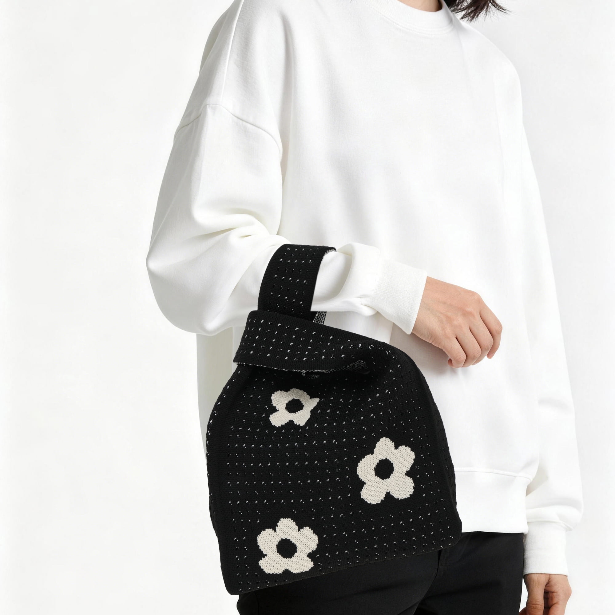 Unique Bargains Stylish Openwork Flower Knitted Wrist Bag for Everyday Use Black