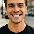 thumbnail image 2 of Copper Zirconia Vampire Fang Grillz for Men & Women, Gold & Silver Tone with Cone & Teardrop Tips, Wave Design Iced Teeth Jewelry for Hip Hop Parties, 2 of 5