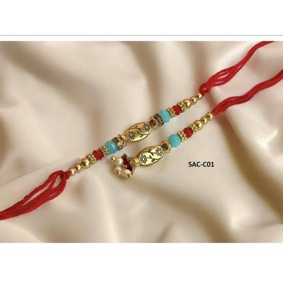 Traditional Rakhi for Brother – Gold Beads, Floral Design & Red Thread