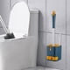 thumbnail image 1 of Escobilla de baño de pared con mango largo y bandeja integrada | Diseño de doble cabezal para limpiar esquinas | Base antideslizante | Herramienta de limpieza para baño que ahorra espacio, 1 of 5