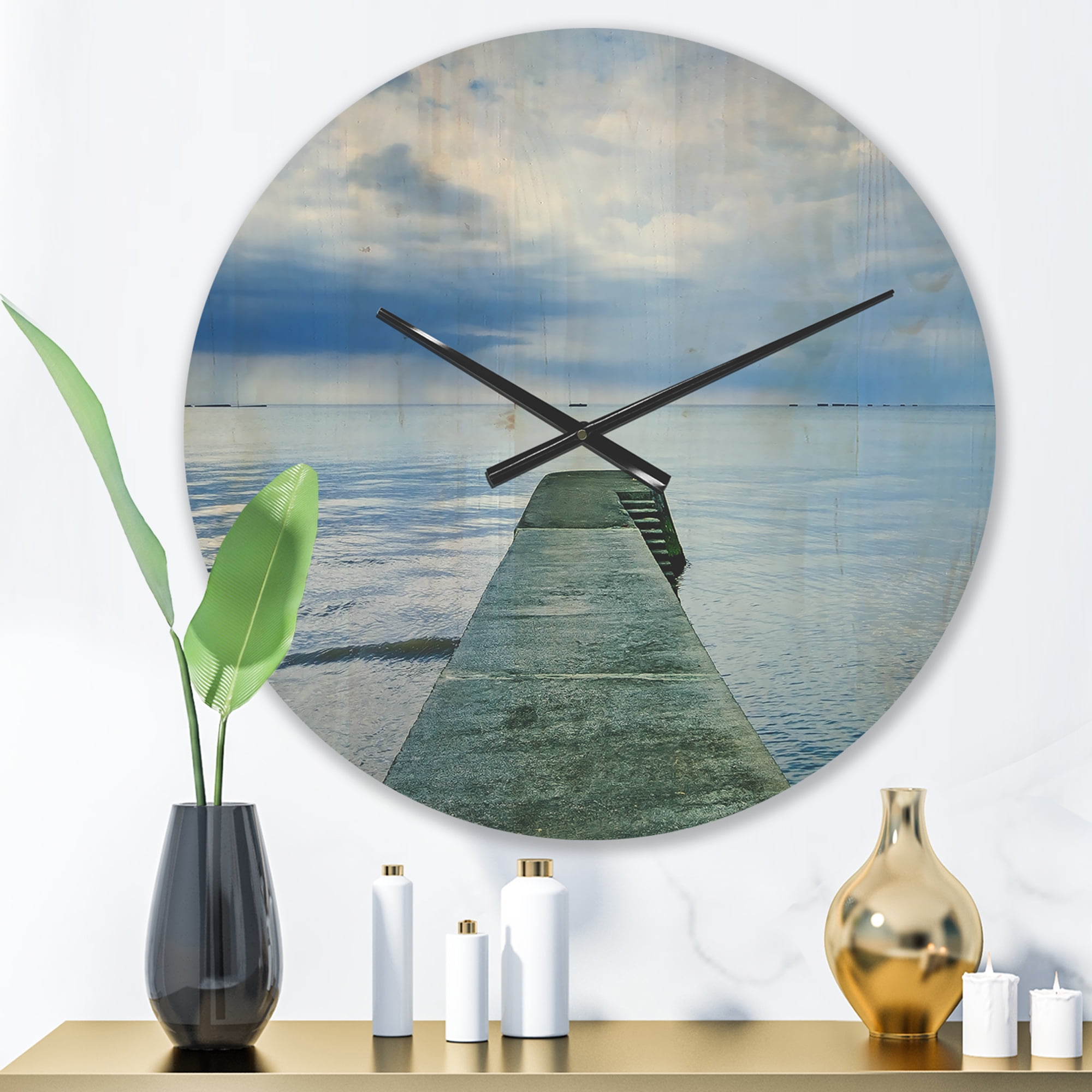 Designart 'Concrete Lake Pier Under Cloudy Sky ' Modern Wood Wall Clock