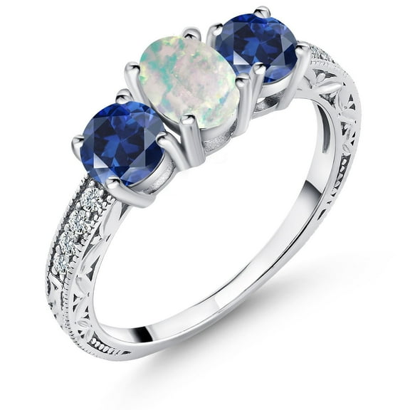Gem Stone King 925 Sterling Silver White Simulated Opal and Blue Created Sapphire Ring for Women 1.95 Cttw, Oval 7X5MM and Round 5MM (Size 6)