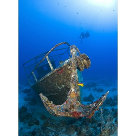 Divers visit the wreck of the Pelicano which sits on the bottom of the Caribbean Sea near Playa Del Carmen Mexico Poster (Best Month To Visit Playa Del Carmen)
