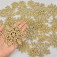 thumbnail image 5 of ZHANQUNE Glitter Snowflake Decorations 36-Pack Christmas Tree Ornaments Plastic Gold Snowflakes for Window Door Holiday Winter Party Decor, 5 of 6