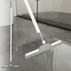 thumbnail image 1 of Raspador de piso con cabezal giratorio de 180 grados, raspador de piso con mango largo de 53 pulgadas, escobas de goma, escobas de goma para limpiar ventanas, azulejos de baño, garaje y concreto., 1 of 5