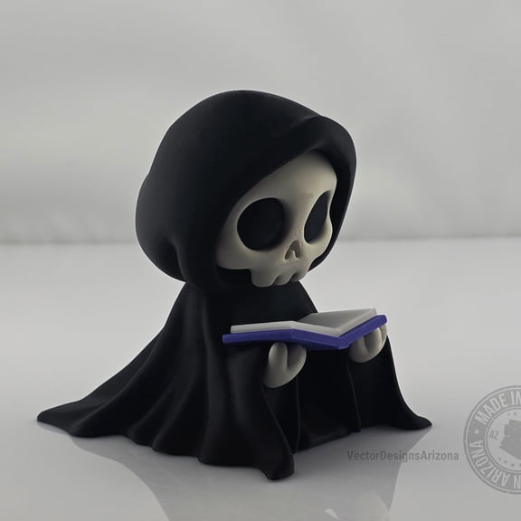 Grim Reaper Reading Figurine, 3D Printed Gothic Bookshelf Decor, 3 in Tall, Black Figure with Purple Book