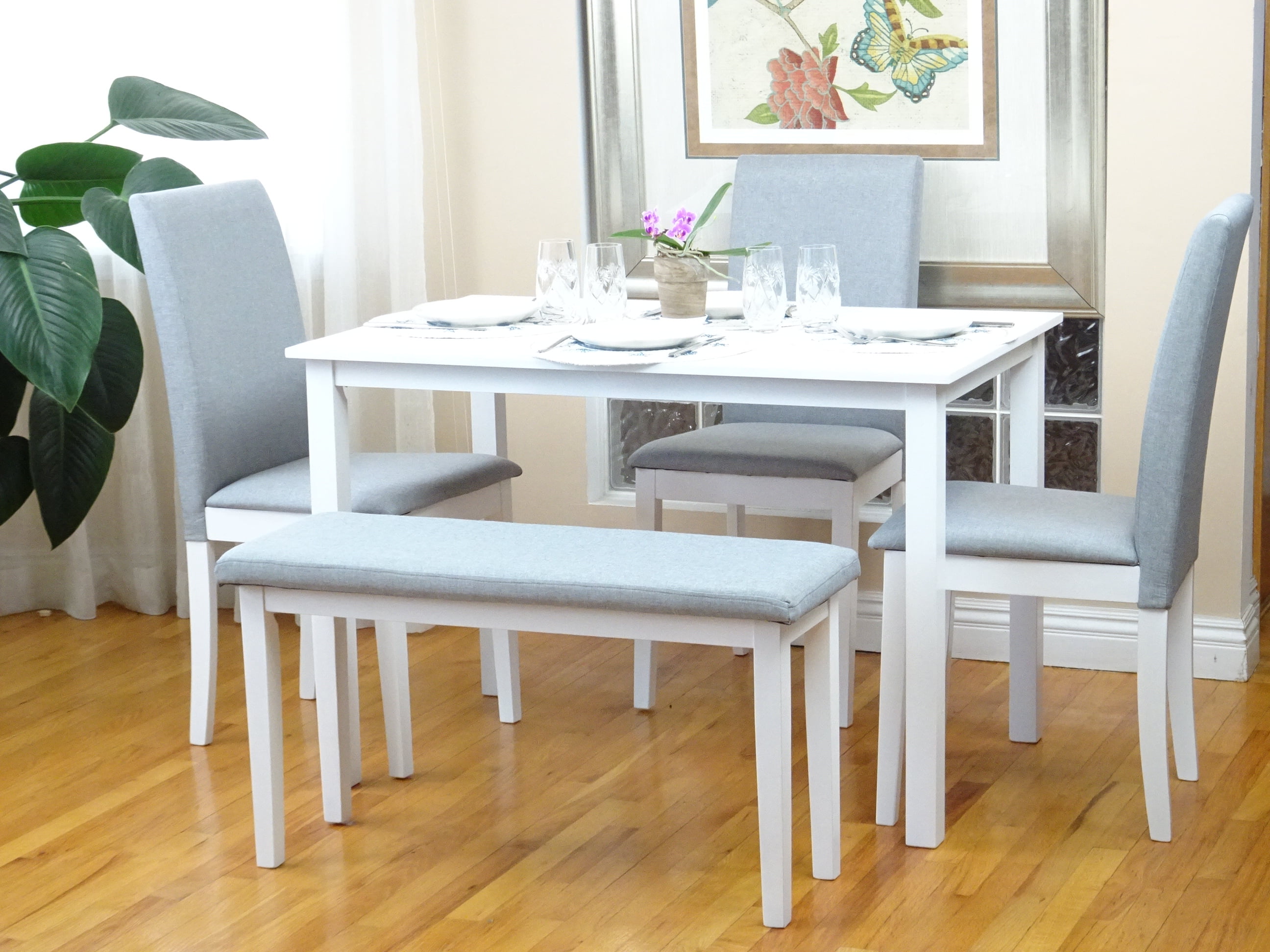 white and wood kitchen table with bench