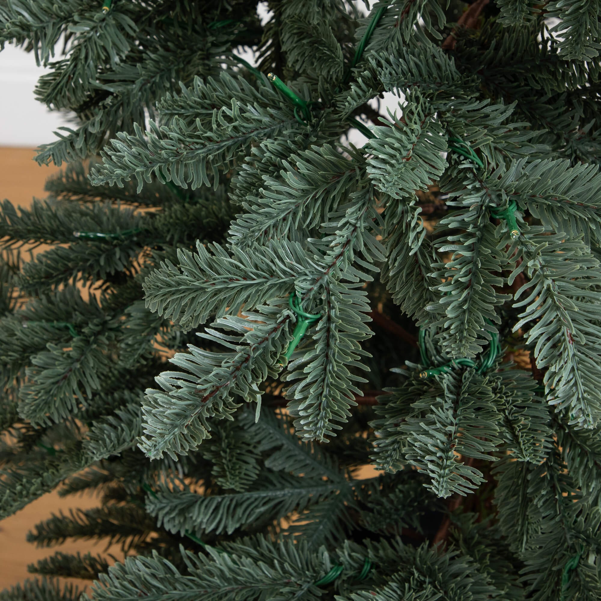 Nearly Natural 6ft. Pre-Lit Artificial Pine Christmas Tree in Round Black Decorative Planter with 60 Warm White LED Lights