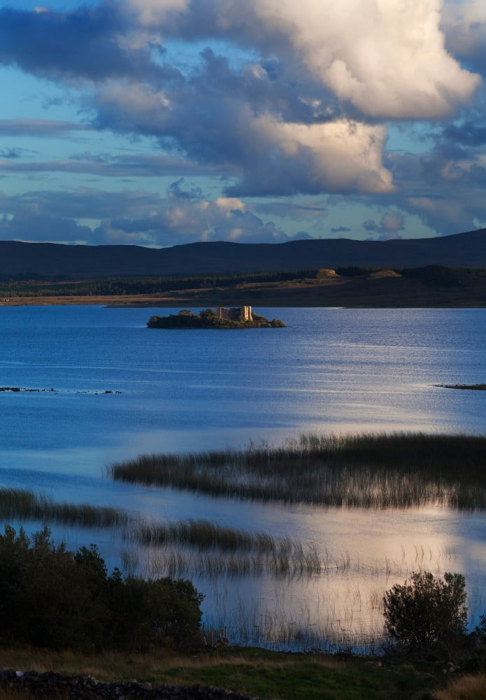 12 th Century Norman Hens Castle (Caislean-na-Circe) home of pirate Queen of Connemara Grace O`Malley Located on Lough Corrib between Maam and Doon Cunty Galway Ireland Canvas Art - Panoramic Images (