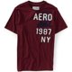 thumbnail image 1 of Aeropostale Hombres Aero Athl. Camiseta gráfica de 1987, roja, talla extra pequeña Aeropostale  Camiseta gráfica, 1 of 2