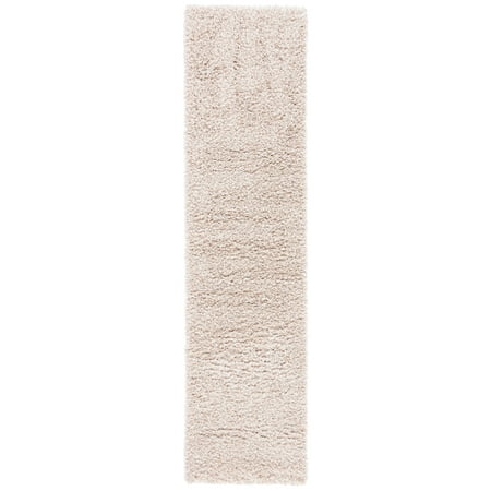 Safavieh SAFAVIEH California Shag Collection SG151-1313 Beige Rug SAFAVIEH California Shag Collection SG151-1313 Beige Rug SAFAVIEH s California Shag Collection imparts breezy coastal vibes throughout room decor. These plush pile shags are made using high-quality synthetic yarns  machine-woven into luxurious shag textures and colored in vivid hues with stylishly speckled tonal colors. These superior non-shedding shag rugs add flowing dimension to any decor  and are also well-suited for higher-traffic areas of the home with frequent kid or pet activity. Perfect for the living room  dining room  bedroom  study  home office  nursery  kid s room  or dorm room. Rug has an approximate thickness of 2 inches. For over 100 years  SAFAVIEH has set the standard for finely crafted rugs and home furnishings. From coveted fresh and trendy designs to timeless heirloom-quality pieces  expressing your unique personal style has never been easier. Begin your rug  furniture  lighting  outdoor  and home decor search and discover over 100 000 SAFAVIEH products today.
