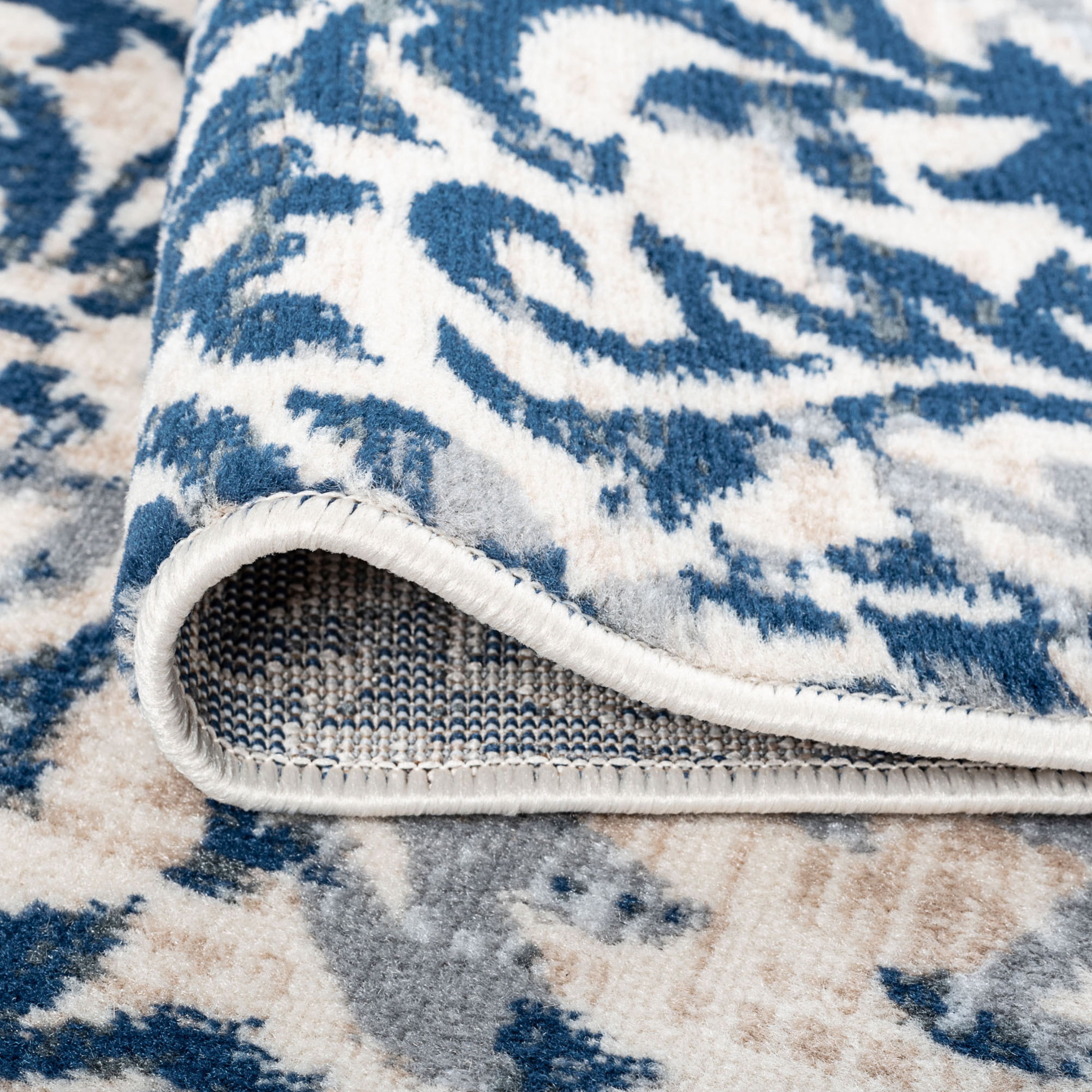 Madison Traditional 5' x 7' Cream Polypropylene Indoor Area Rug