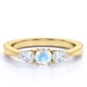 thumbnail image 1 of JeenMata Anillo de Compromiso de 1,5 Quilates con Piedra Lunar y Moissanita de Corte Redondo y Hombros Curvos en Oro Amarillo de 18 K sobre Plata, 1 of 6