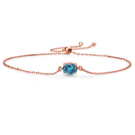 Gem Stone King 18K Rose Gold Plated Silver London Blue Topaz Solitaire Bracelet for Women (1.00 Cttw, Oval Cut 7x5mm)