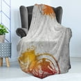 thumbnail image 4 of Basketball Soft Flannel Fleece Blanket, Basketball Streetball and Paint Stains Image on Concrete Wall Rustic Print, Cozy Plush for Indoor and Outdoor Use, 60" x 80", Charcoal Orange, by Ambesonne, 4 of 5