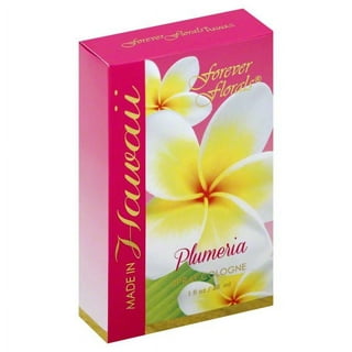 Plumeria Essential Oil Perfume and yellow plumeria flowers on the wooden  table, Stock image