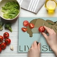 thumbnail image 3 of Sloth Cutting Board, Relaxed Happy Animal Lying and Eating Character Live Slow Phrase, Decorative Tempered Glass Cutting and Serving Board, Large Size, Pale Brown, by Ambesonne, 3 of 5