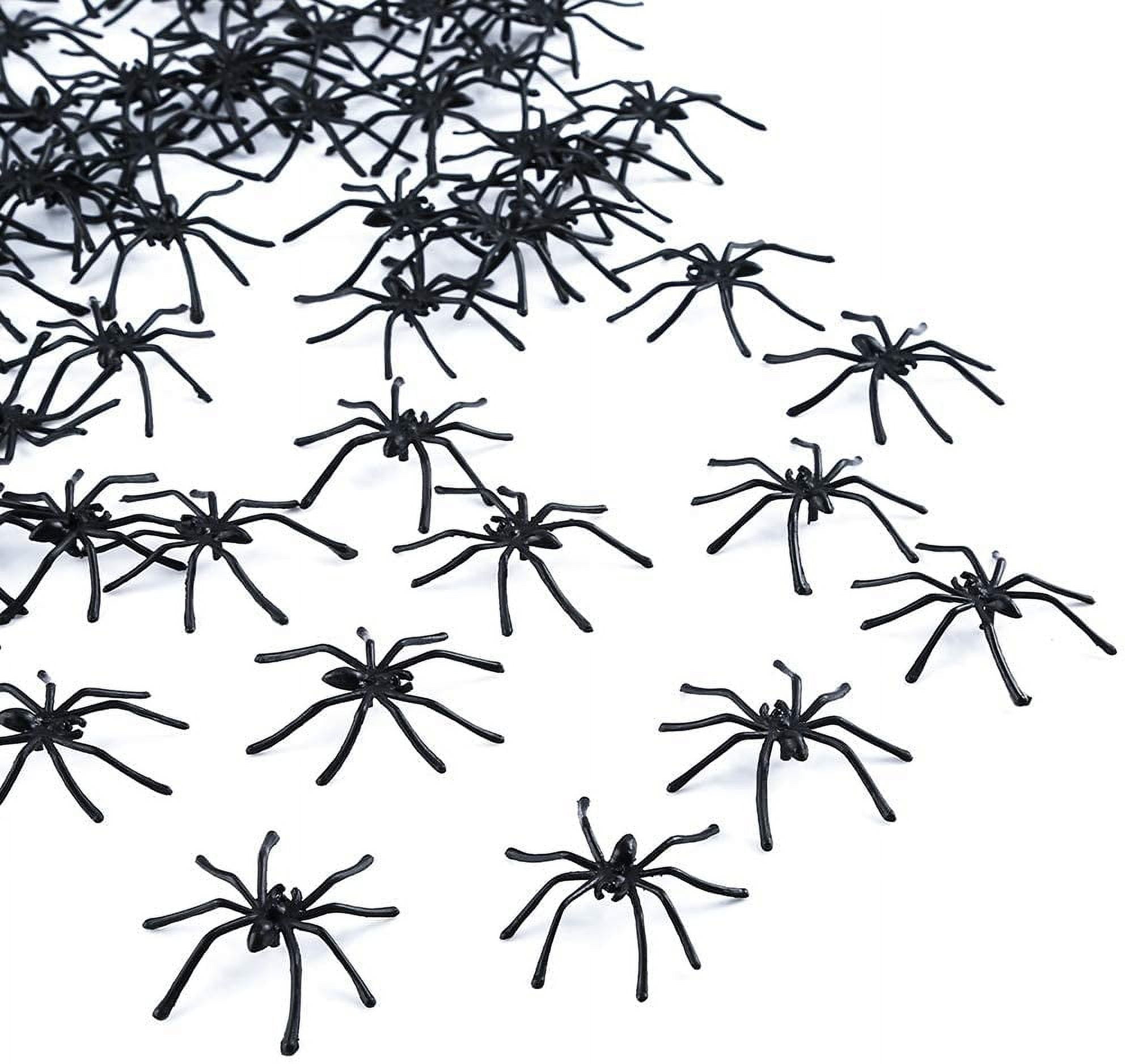 White plastic spiders online