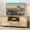 White A, variant on NEILA TV Stand for TV up to 70'', Rattan Entertainment Center with Doors and Adjustable Shelves, Stable Legs, TV Media Console Table for Living Room, Bedroom, Natural Oak