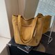 thumbnail image 4 of Bolso casual de color sólido de gran capacidad, versión coreana, primavera y verano 2025, nuevo estilo, bolso de recuperación para uso fuera de la escuela, bolso de mano para hombro y axila., 4 of 5