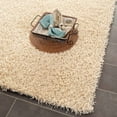 thumbnail image 3 of SAFAVIEH Clyde Solid Plush Polyester Shag Area Rug, Cream, 6' x 9', 3 of 7