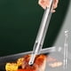 thumbnail image 5 of Pinzas de acero inoxidable para parrilla - Pinzas extendidas de 40 cm para carne, hamburguesas y barbacoa - Utensilios de cocina resistentes al calor con asa ergonómica, 5 of 6