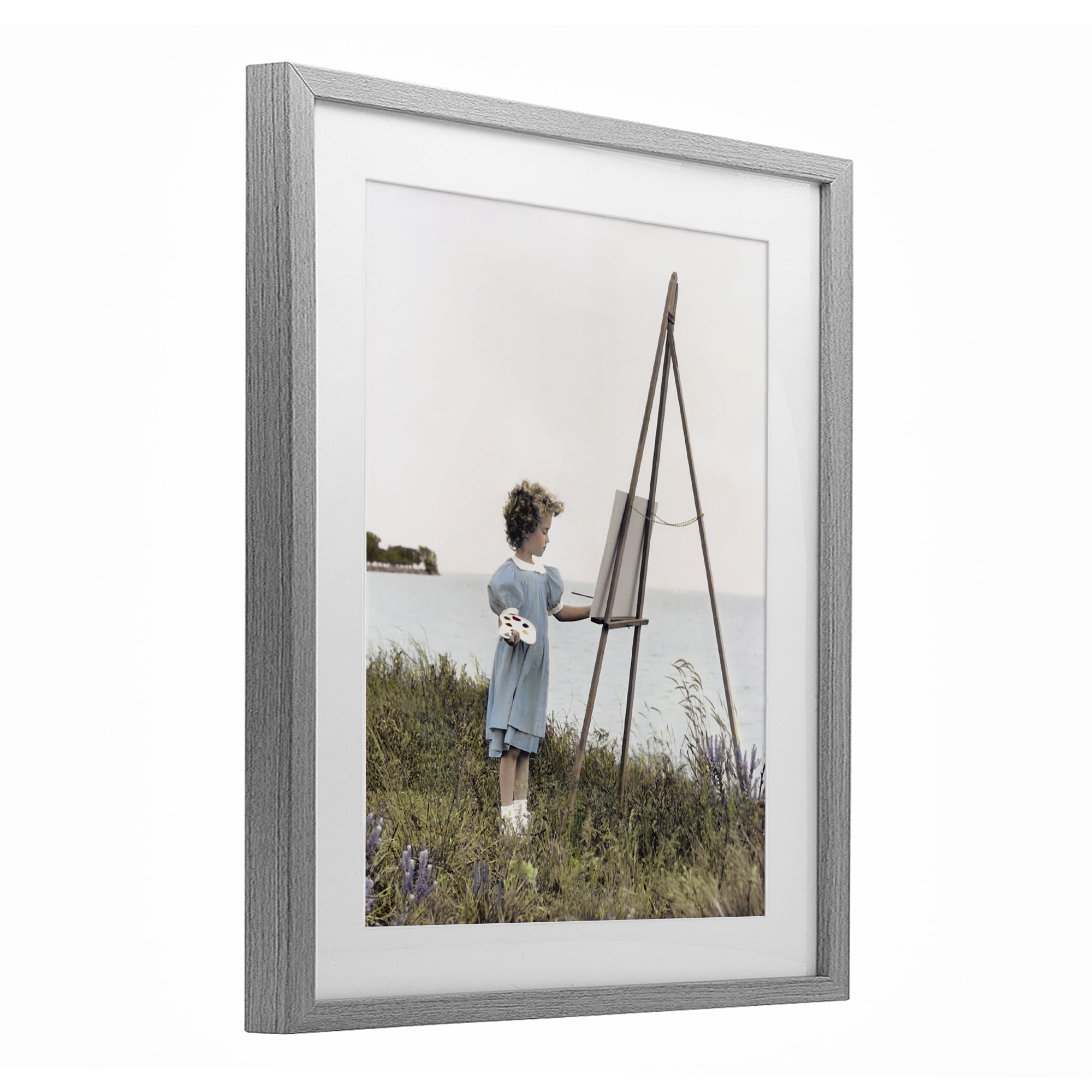 Stupell Industries Child Painting on Easel Gray Framed Print Under Glass, design by Kendra Dew