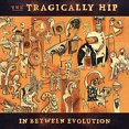 thumbnail image 1 of The Tragically Hip - In Between Evolution (Vinyl LP), 1 of 2