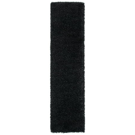 Safavieh SAFAVIEH California Shag Collection SG151-9090 Black Rug SAFAVIEH California Shag Collection SG151-9090 Black Rug SAFAVIEH s California Shag Collection imparts breezy coastal vibes throughout room decor. These plush pile shags are made using high-quality synthetic yarns  machine-woven into luxurious shag textures and colored in vivid hues with stylishly speckled tonal colors. These superior non-shedding shag rugs add flowing dimension to any decor  and are also well-suited for higher-traffic areas of the home with frequent kid or pet activity. Perfect for the living room  dining room  bedroom  study  home office  nursery  kid s room  or dorm room. Rug has an approximate thickness of 2 inches. For over 100 years  SAFAVIEH has set the standard for finely crafted rugs and home furnishings. From coveted fresh and trendy designs to timeless heirloom-quality pieces  expressing your unique personal style has never been easier. Begin your rug  furniture  lighting  outdoor  and home decor search and discover over 100 000 SAFAVIEH products today.