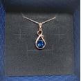 thumbnail image 4 of Silver & Stone Jewels Stunning 14K Rose Gold Finish Oval Cut Blue Cubic Zirconia Love Heart Shape Pendant, 4 of 4