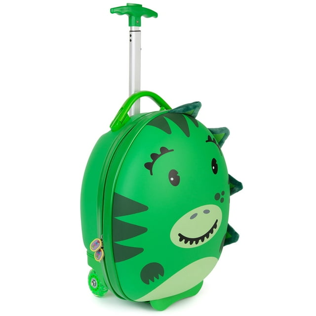 BOPPI Tiny Trekker Kids Luggage - Lightweight Travel Suitcase Carry On Cabin Bag with Wheels and Stopper for Toddlers. This green suitcase features a playful dinosaur design with soft spikes on the sides. It has an extendable handle adjustable from 60 cm to 72 cm, two easy-rolling polyurethane wheels, and a sturdy yet lightweight construction. The 17-litre capacity includes a large storage area with holding straps and a double-zipped compartment for organization. Compact dimensions of 42 cm height, 30 cm width, and 22 cm depth make it cabin-friendly and easy to store.