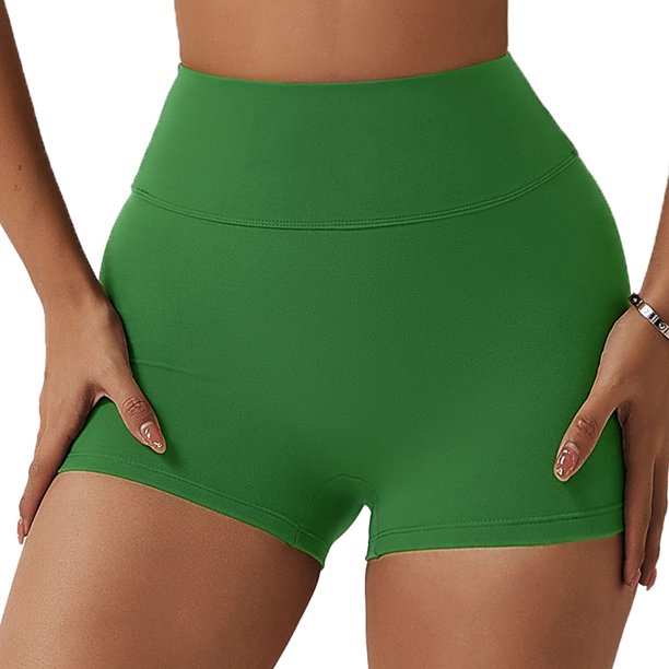 La cintura alta del entrenamiento del gimnasio del doblez de la yoga de los pantalones cortos apretados de las mujeres pone en cortocircuito los pantalones calientes de elevación de la nalga