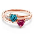 thumbnail image 2 of Gem Stone King 18K Rose Gold Plated Silver London Blue Topaz Red Created Ruby and White Lab Grown Diamond Ring for Women (1.23 Cttw, Gemstone Birthstone, Size 5), 2 of 5