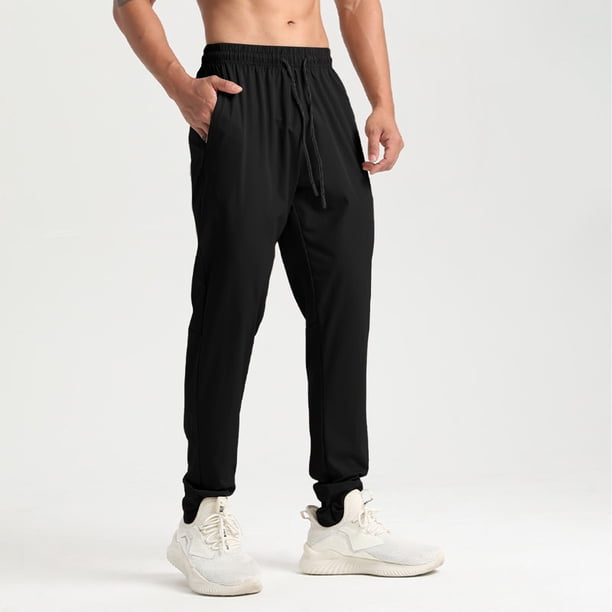 Pantalones largos para hombre, casuales, de moda, de color sólido, con cordón, cintura elástica y bolsillos.