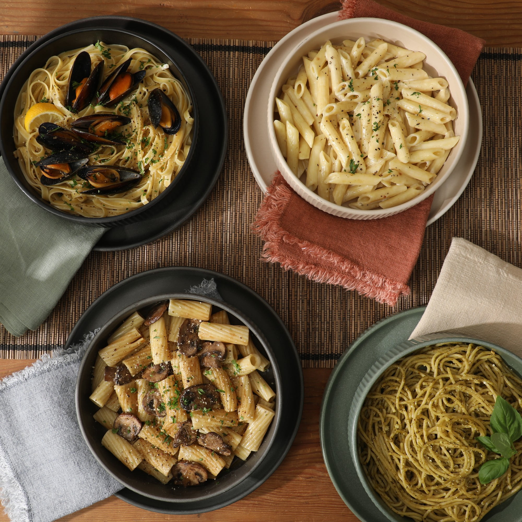 Gibson Elite Deerfield 16-Piece Stoneware Dinnerware Set – Stackable Plates and Bowls, Reactive Glaze Finish, Service for 4 - Matte Black