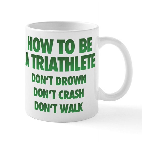 CafePress - How To Be A Triathlete - 11 oz Ceramic Mug - Novelty Coffee Tea Cup