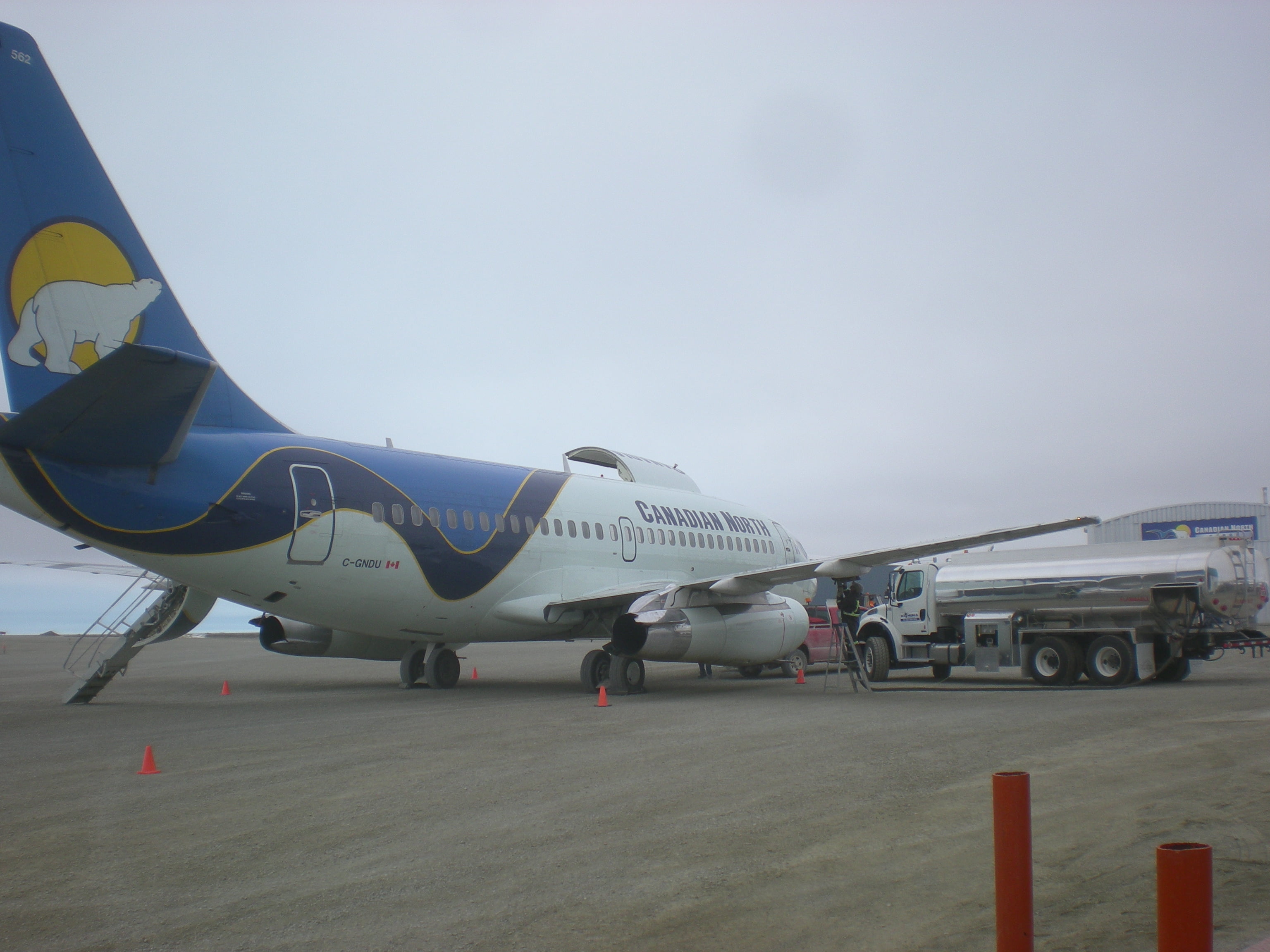 LAMINATED POSTER Canadian North's B737 CGNDU being refulled at
