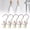 Beige, variant on Pack of 5 Clothes Pegs, Trouser Hangers with Clips, 360° Rotating Staple Hook, Stainless Steel Trouser Hook, Boot Clips, Clothes Hanger with Clips, Laundry Hooks for Trousers, Shoes, Towel