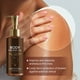 thumbnail image 5 of Aceite Corporal Iluminador 100 Ml | Repara La Hidratación Apagada | Fija La Hidratación | Nutre E Ilumina | Uniformiza El Tono | Fórmula Suave y Calmante | Nutrición Profunda | Hidratación Duradera |, 5 of 7