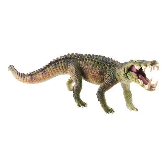 figura de cocodrilo fiudx de goma juguete realista accesorios de broma halloween; figura verde con cuerpo alargado y textura escamosa, vista lateral 3/4 con boca abierta y dientes visibles, patas y cola curvada sobre fondo blanco, adecuada como broma o decoración de Halloween.