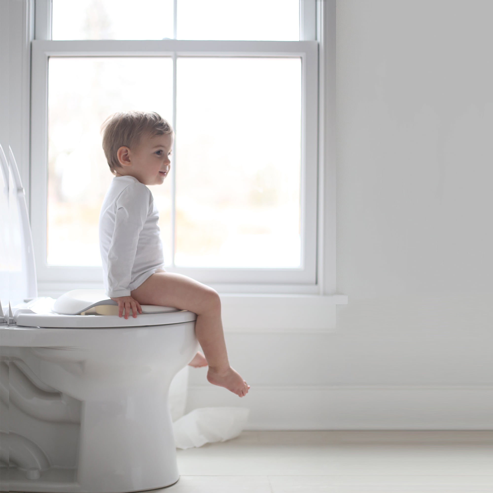 Ubbi Adjustable Toilet Trainer for Toddlers with Built-In Handles & Hanging Hook for Storage, Gray