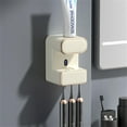 thumbnail image 1 of OUYAWEI Toothpaste Dispenser,Smart Automatic Toothpaste Dispenser Wall Mounted for Bathroom,Toothpaste Squeezer with 3 Toothbrush Slots,Beige, 1 of 7