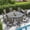 Black Table-Brown Chairs, variant on VOXBIN Patio Dining Set for 8 Outdoor Furniture Includes 63.1" Round Table and Swivel Chairs, Sandshell Color Tabletop and Fabric