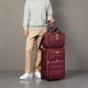 thumbnail image 5 of Juego de equipaje Amazon Basics Carry On de 23 pulgadas con bolsa de mano roja, 5 of 6